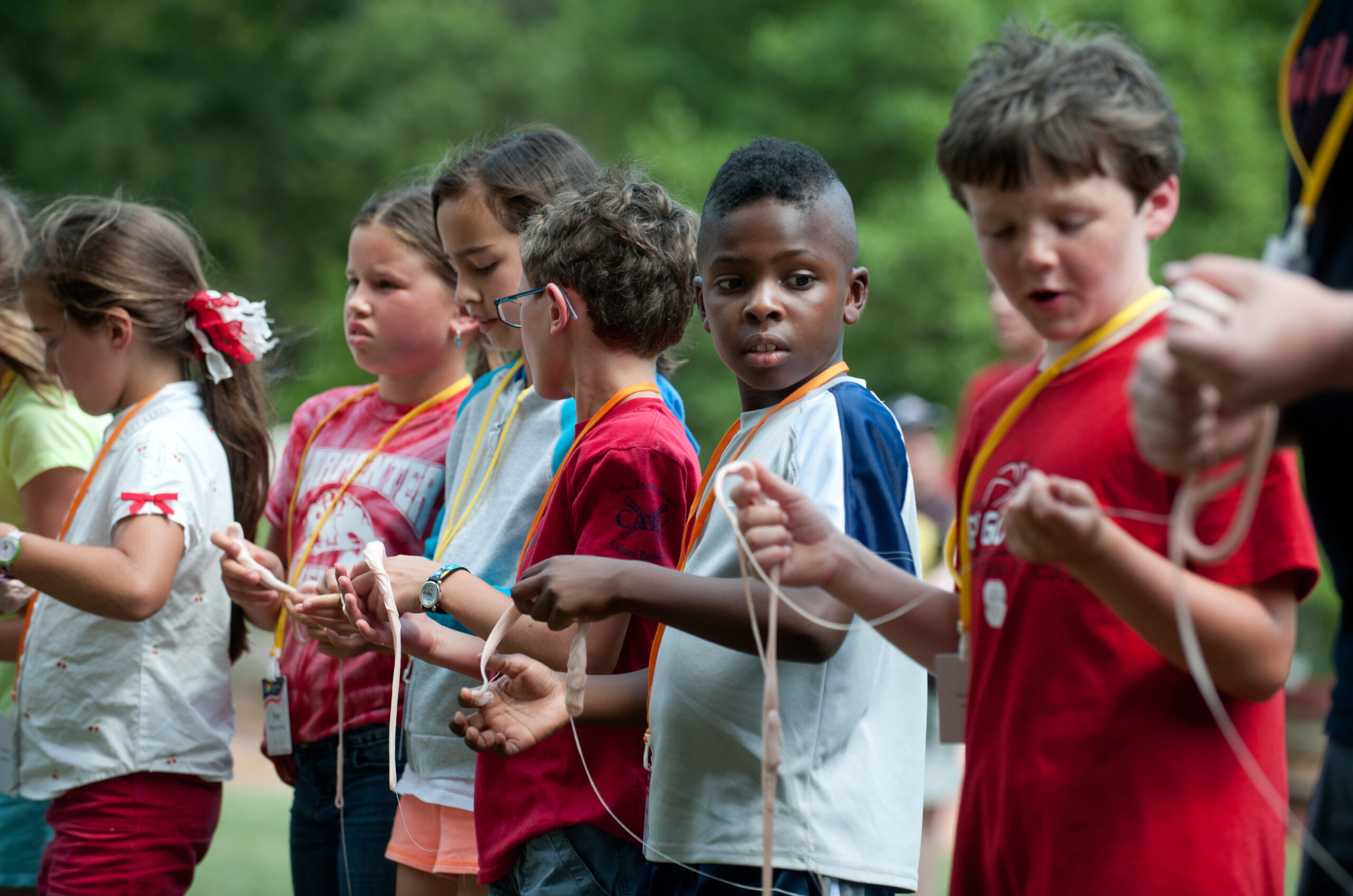 kids participating in an outdoor camp activity